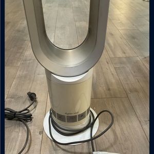 White Dyson cool tower fan air with rotating with timer and speed